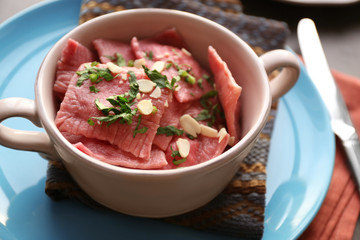 Soup plate with delicious ravioli, closeup