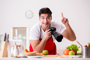 Food photographer taking photos in kitchen