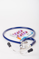 medical tool on white background,stethoscope,syringe,thermometer,