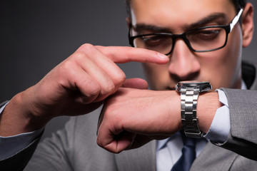 Businessman in time management concept