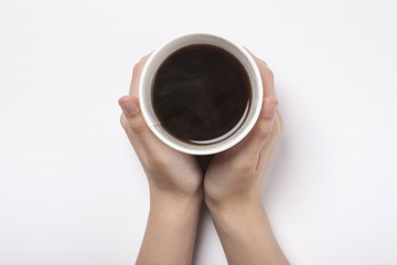 woman hand hold a paper cup with coffee isolated white.