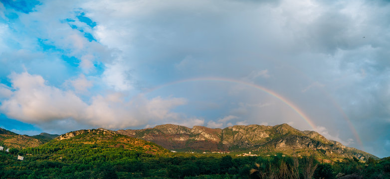 Double rainbow over the mountains. Montenegrin Mountains, the Balkans.