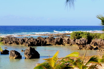 Scenic rock formations, Rota, Northern mariana Islands Rock formations with the waves rolling...