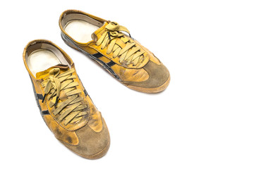 a pair of old grunge and dirty sneaker