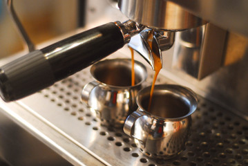 Brewed coffee in espresso coffee machine