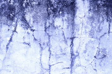 Wall fragment with scratches and cracks