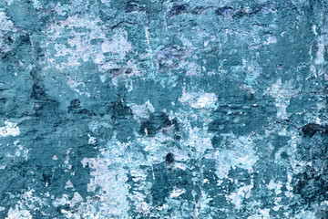 Wall fragment with scratches and cracks