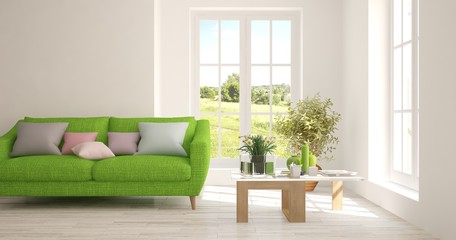 White room with sofa and green landscape in window. Scandinavian interior design. 3D illustration