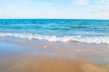 Soft wave on the sandy beach of tropical sea