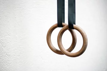Fotobehang Detail of a set of rings in a gymnasium © photology1971