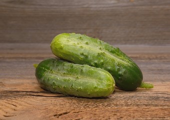 Fresh Cucumber on wooden table