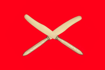 crossed knives