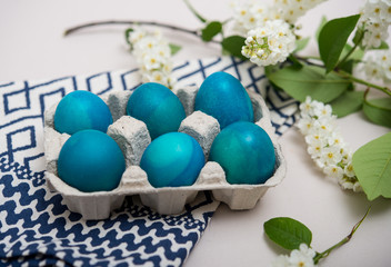 Rustic Easter decoration - painted eggs and spring flower