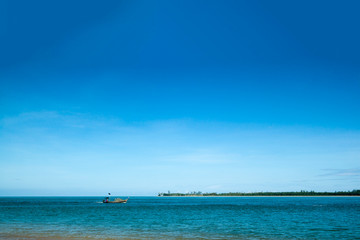 fisherman with longtail boat
