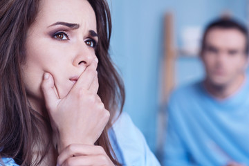 Thoughtful depressed woman focusing on her problems