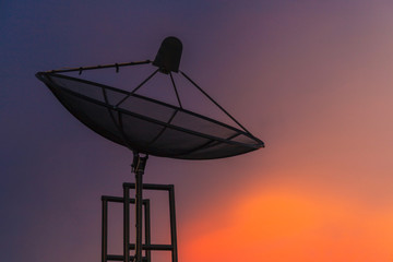 Satellite dish at twilight sky in the city