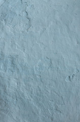 Wall from clay whitewashed with lime, textured background. Ukraine