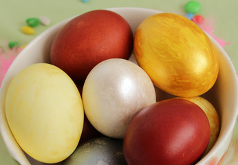 colored Easter eggs in a Cup.