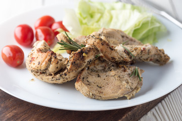 Grilled chicken breast with fresh vegetables