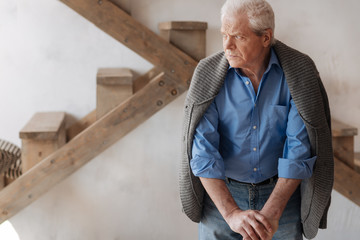 Depressed nice man turning his head