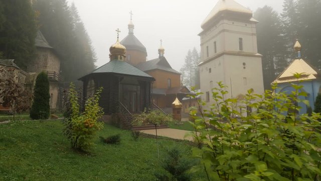 Manyava Skete in Misty Day Ivano-Frankivsk Orthodox Male Monastery Among Carpathian Mountains Ancient Protective Wall Wonderful Humid Coniferous Forest
