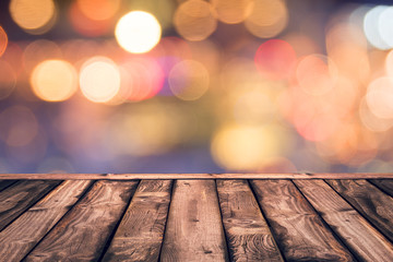 Naklejka na ściany i meble Empty wood table top with blurred lights gold bokeh abstract background