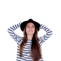 Pretty teenager girl with black hat posing at studio.