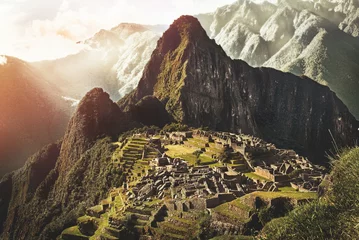 Fototapete Machu Picchu MACHU PICCHU, PERU - MAY 31, 2015: View of the ancient Inca City of Machu Picchu. The 15-th century Inca site.'Lost city of the Incas'. Ruins of the Machu Picchu sanctuary. UNESCO World Heritage site.