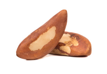 Two Brazil nuts isolated on white background