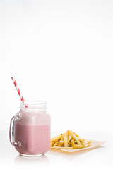 Strawberry milkshake on the white background