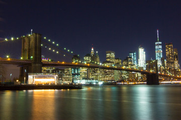 Naklejka na ściany i meble Brooklyn bridge night view , New York, USA
