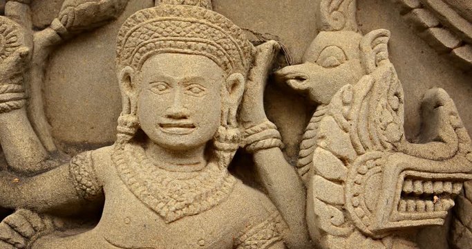 Ancient Relief Sculpture on Temple Wall in Ayutthaya, Thailand