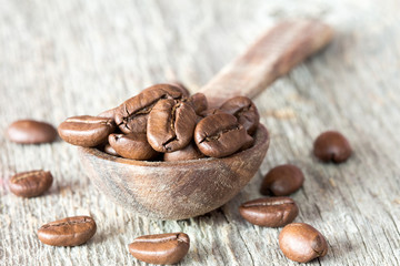 Grains of coffee and a spoon