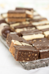 Chocolate cookies served on the plate with blurred background