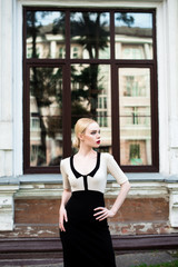 Fototapeta premium Happy Fashion blonde european elegant Woman with red lips and white skin