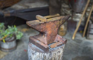 Rusty anvil and hammer