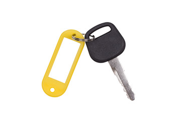 Yellow blank tag and a key isolated on white background.(With clipping path.)