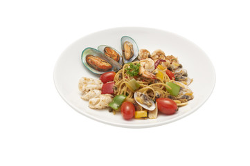 Seafood pasta Spaghetti with Clams, Prawns, Seafood Cocktail isolated on white background clipping path.