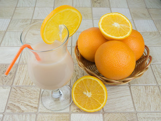 the cocktail decorated with orange slices