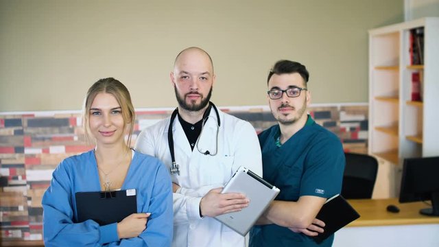 Portrait of smiling medical workers on a hospital medical room office