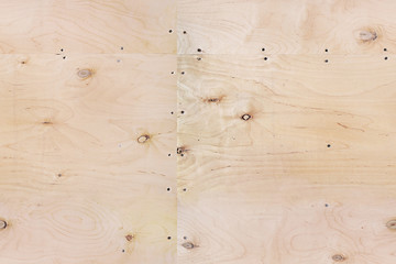 Plywood background with knots light. Seamless
