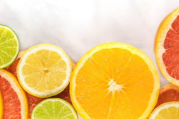  Grapefruit, lime, lemon, and orange slices with copyspace