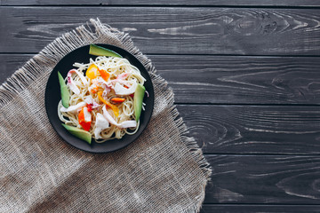  pasta with seafood on wooden background