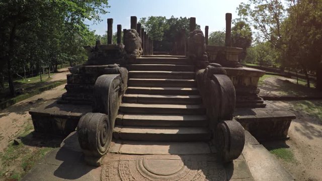 Climbing the Ancient Steps of the Royal Council Chamber in Polonnaruwa