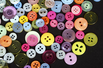 Fototapeta na wymiar An assortment of coloured buttons