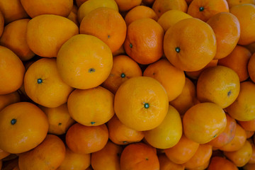 Background and texture of pile orange.