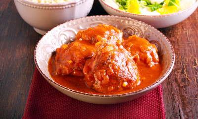 Chicken thighs in spicy tomato sauce