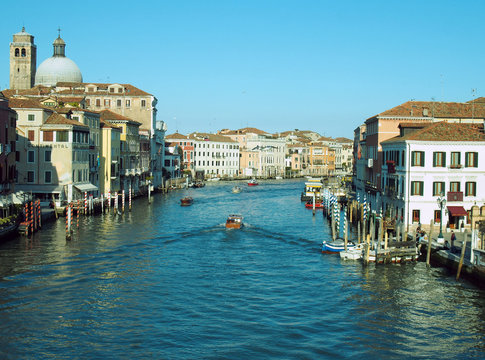 the grand canal in Venice with boat and blue sky