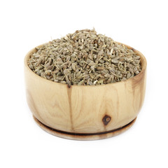 anise in wooden cup isolated