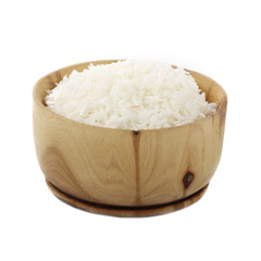 Dried grated coconut in wooden cup isolated on white background